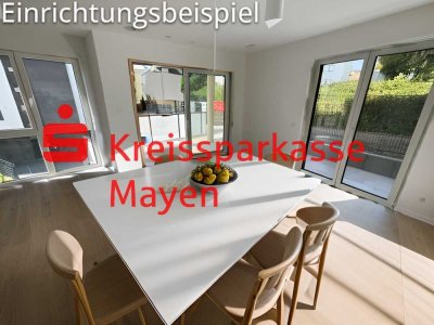 Sofort einziehen. Erdgeschoßwohnung mit Terrasse und Doppelgarage.