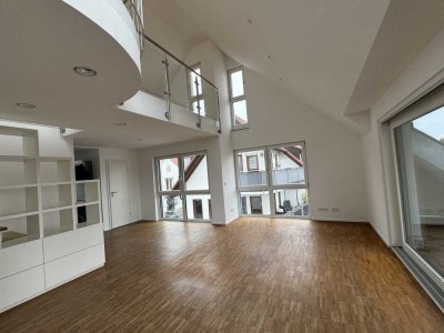 Stilvolle 4,5 Zimmer-Galeriewohnung mit großem Südbalkon