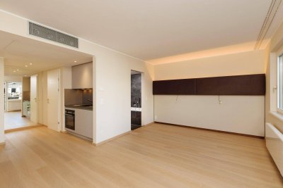 BESTE INVESTITION! Moderne Wohnung nähe SCHLOSS BELVEDERE mit BALKON, GARAGE, GYM und Concierge-Service!