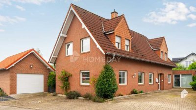 Sofort bezugsfreies MFH mit 2 Wohneinheiten, Garten, Garage, EBK und Terrasse in beliebter Lage