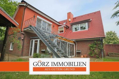 Ihr Traum wird wahr! Wohn- und Geschäftshaus mit Einliegerwohnung mit Süd-Balkon und Wintergarten -