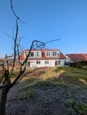 **Erstbezug**moderne Wohnung mit Gartenanteil am Fuße der Weinberge