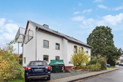 Gepflegte 4-Zimmerwohnung mit Balkon in modernisiertem 3-Familienhaus