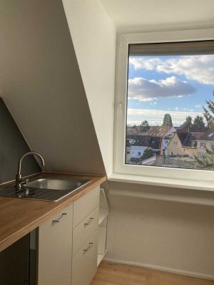 Helle 2 ZKB Dachgeschosswohnung mit Gartenanteil in Mannheim