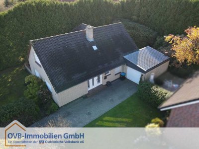 Einfamilienhaus mit Garage und großzügigem Grundstück