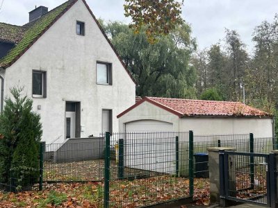 Reihenendhaus
mit Garage und Gartenhaus