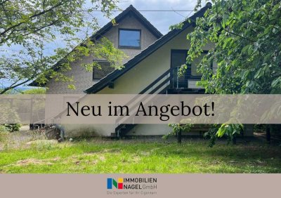 Großes Zweifamilienhaus mit Doppelgarage,  Wellnesstrakt und Weitblick in Bad Oeynhausen!