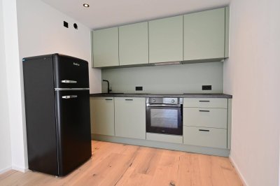 PROVISIONSFREI | PARSCH | ALLES NEU Generalsanierte 2-Zimmerwohnung mit 18 m² Sonnen-Terrasse und hochwertiger Ausstattung