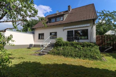 Großes Zweifamilienhaus mit drei Garagen, großer Dachterrasse  und tollem Südgarten in Top-Lage