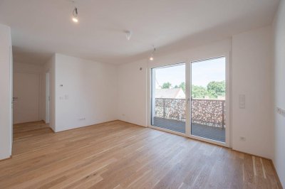 Wohnen im Bel Atrium: Zwei Zimmer Neubau Wohnung mit Balkon, inkl. Stellplatz und vielen Extras