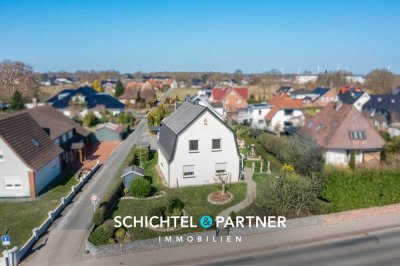 Ganderkesee | Modernisiertes Zweifamilienhaus mit Garten & Doppelcarport