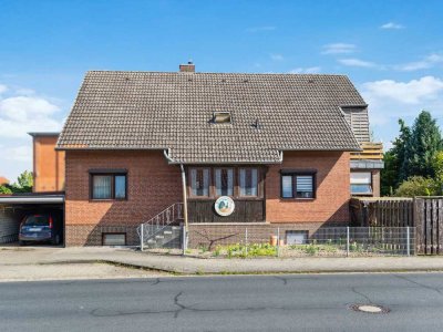 Solides Zweifamilienhaus mit Garten in Meine