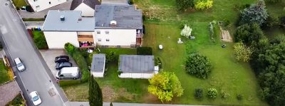 Attraktives Mehrfamilienhaus in begehrter Wohngegend mit Rheinblick– Grundstück mit Potenzial