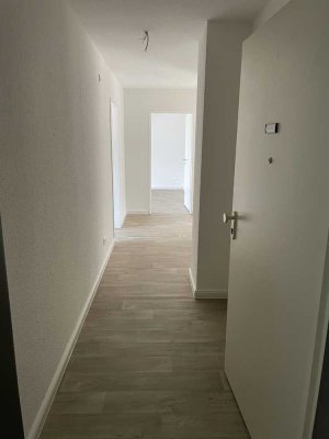 Zentrale, sonnige 3 Zimmer DG Wohnung mit Balkon und Stellplatz