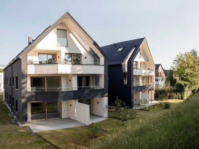 Elegante 3-Zimmer-Wohnung am Ufer des Neckars mit eigenem Garten.