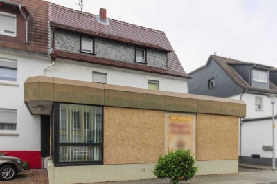 Gestaltbares Zuhause in Roßdorf: DHH mit Renovierungsbedarf in naturnaher Lage