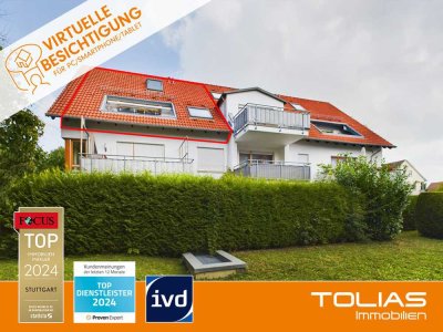 Ein liebevolles Zuhause: Traumhafte Maisonette-Wohnung in schöner Lage mit 2 TG-Stellplätzen.