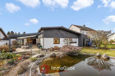 Zeitlos wohnen am Sommerwald – Großzügiger Bungalow mit Gartenparadies
