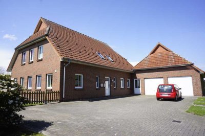 Dachgeschosswohnung mit Gartenanteil und Garage