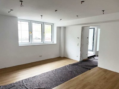 2 Zimmer Wohnung mit Einbauküche und Garten + 20 qm Terrasse