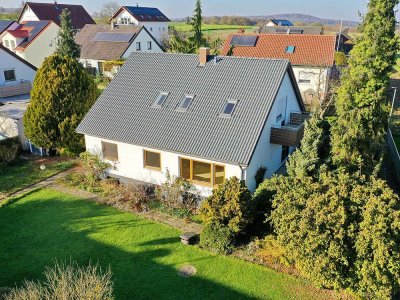 Einfamilienhaus mit Einliegerwohnung, großem Garten, Garage und Carport  in ruhiger Lage