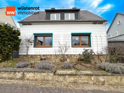 Viel Platz, viel Potential. Einfamilienhaus mit großem Garten & Wintergarten