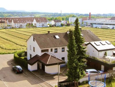 Eleganz trifft auf Gemütlichkeit: 6,5-Zimmer-Terrassenwohnung mit 2 Balkonen, Wintergarten & Garage