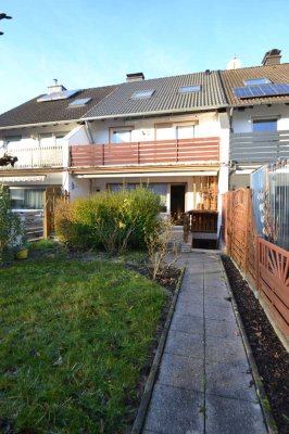 Reihenmittelhaus mit südausgerichteten Garten, Balkon, Kamin, Einzelgarage in Lützenkirchen!