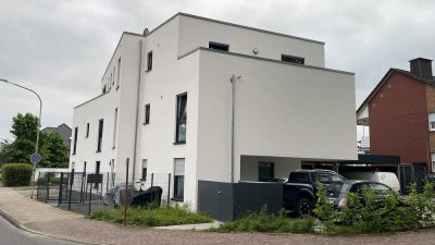 Zentrale Neubau EG-Wohnung mit Terrasse & kleinem Garten