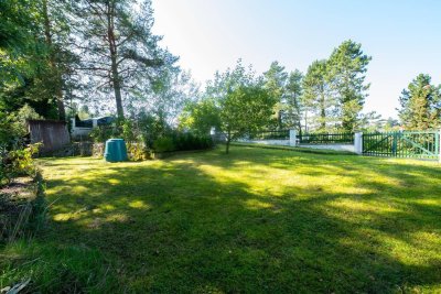 NEUER PREIS ! Eigentum statt Miete – Einfamilienhaus mit Garten, Terrasse und zwei Garagen in sonniger Lage!