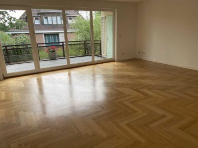 Exklusive Traumwohnung mit Garten zur Alleinnutzung und großem Balkon