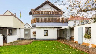 Beeindruckendes MFH mit 3 Wohnungen, Terrasse, 2 Balkonen und Garten in ruhiger Lage + Baufenster