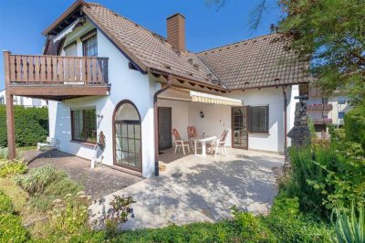 Leben auf einer Ebene! Winkelbungalow mit ausgebautem Dachgeschoss in Top-Wohnlage