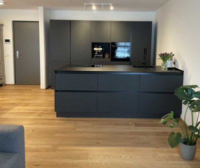 3 Zimmer Neubau Wohnung mit EBK und Garten