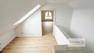 Hell und geräumig: Schicke Maisonettewohnung mit Dachstudio, Balkon und Stellplätzen!