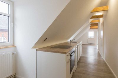 Helle Dachgeschosswohnung mit fantastischem Schleiblick vom Sonnenbalkon