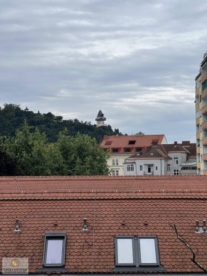 Über den Dächern von Graz inklusive Schloßbergblick