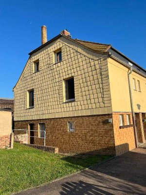 Schöne Eigentumswohnung - Reihenendhaus in ruhiger Lage mit Garten und Schuppen