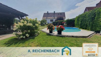 Ein- bzw. Zweifamilienhaus mit Pool, Garagen, PV Anlage und vielen Extras in Altengottern!