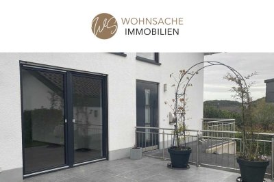 Exklusive 5,5-Zimmer-Wohnung mit Einbauküche und Garagenstellplatz in zentraler Lage von Much!