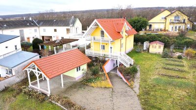 Einfamilienhaus mit Seeblick mit großem Potenzial.