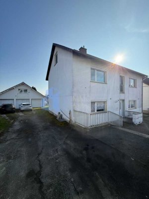 Gepflegtes 2 Familienhaus teilvermietet mit großem Grundstück in Calden/ Obermeiser