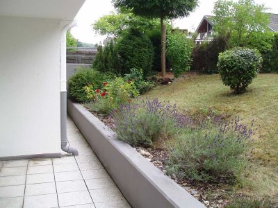 Sonnige Terrassenwohnung mit Gartennutzung