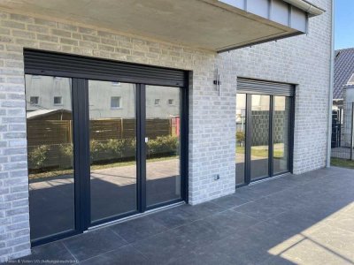 Baesweiler! Moderne Erdgeschosswohnung mit Terrasse und Garage.