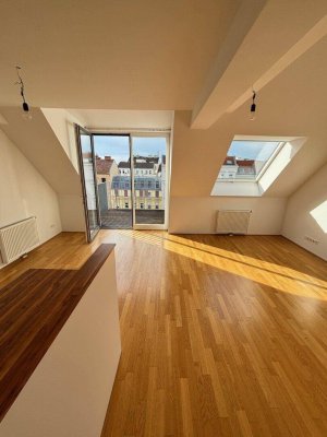 SONNIGE DACHMAISONETTE MIT BALKON in schönem ALTBAU 1100 Wien