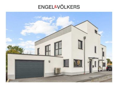 Engel & Völkers: Neuwertige Doppelhaushälfte mit viel Platz zum Wohlfühlen!