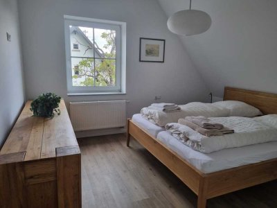 Modern sanierte 90 m² Dachgeschosswohnung mit Balkon und großzügigem Wohnbereich in ruhiger Lage