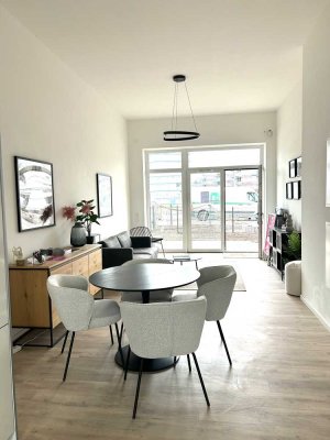 Moderne 3-Zimmer Wohnung mit Terrasse, Einbauküche und kleinem Garten