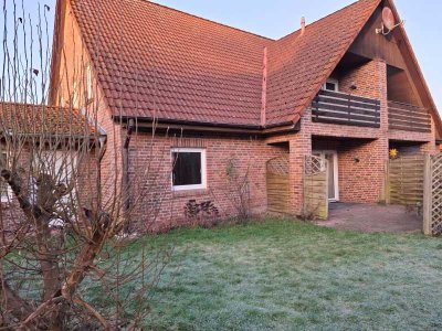 Schöne Erdgeschosswohnung mit Terrasse und Garten