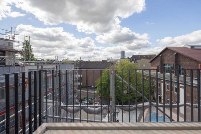 Enjoy the Skyline! 3-Zimmer-Wohnung mit großer Dachterrasse zum Erstbezug!